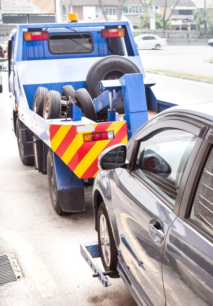 tow truck pulling car